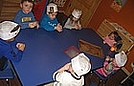 Shaping their bread rolls